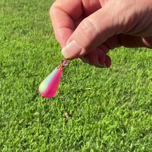 Large Frosted Pink Handmade Teardrop Earrings video showing how the AB sheen looks when the light hits it.