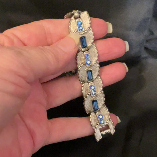 BSK Blue Rhinestone Vintage Articulated Link Bracelet video showing how the rhinestones sparkle in the light.