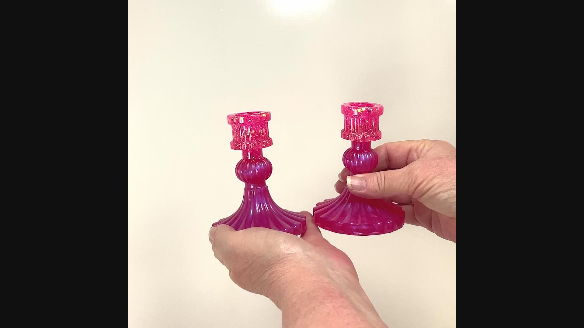 Vintage Style Handmade Bright Pearly Pink Resin Candlestick Holders video showing how the glitter sparkles in the light.