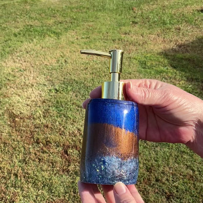 Oval Pearly Blue and Brown Resin Handmade Soap Dispenser video showing how the glitter sparkles in the light.