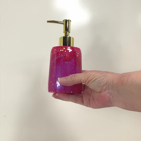 Oval Handmade Bright Pearly Pink and Glitter Resin Soap Dispenser video showing how the glitter sparkles in the light.
