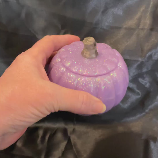 Video of the light purple pumpkin trinket box showing how the iridescent pastel glitter sparkles as the light hits it.