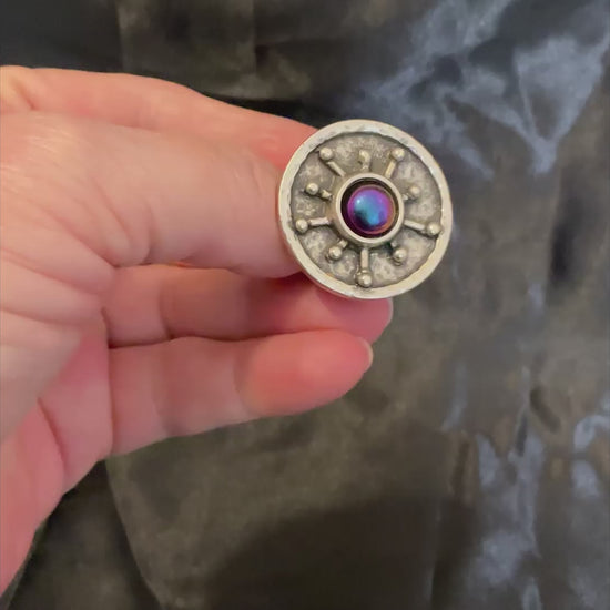 Video of the color shift starburst ring showing how the colors change depending on how the light is hitting it.