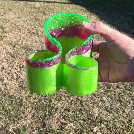 Handmade Lime Green and Pink Resin Makeup Brush Holder with Iridescent Glitter video showing how the glitter sparkles in the light.