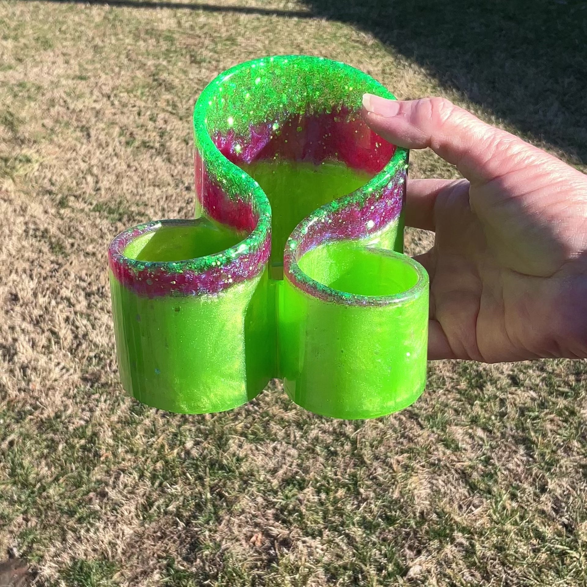 Handmade Lime Green and Pink Resin Makeup Brush Holder with Iridescent Glitter video showing how the glitter sparkles in the light.