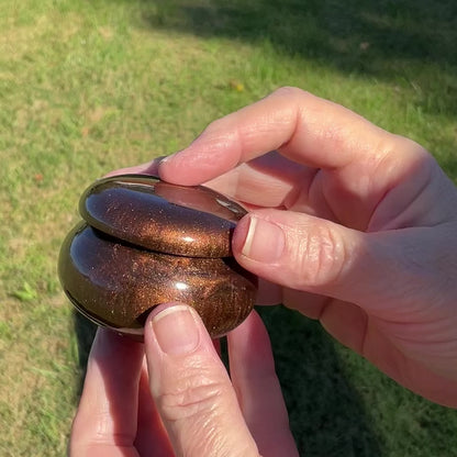 Small Pearly Brown and Blue Resin Handmade Round Trinket Box with Iridescent Purple Glitter video showing how the glitter sparkles in the light.