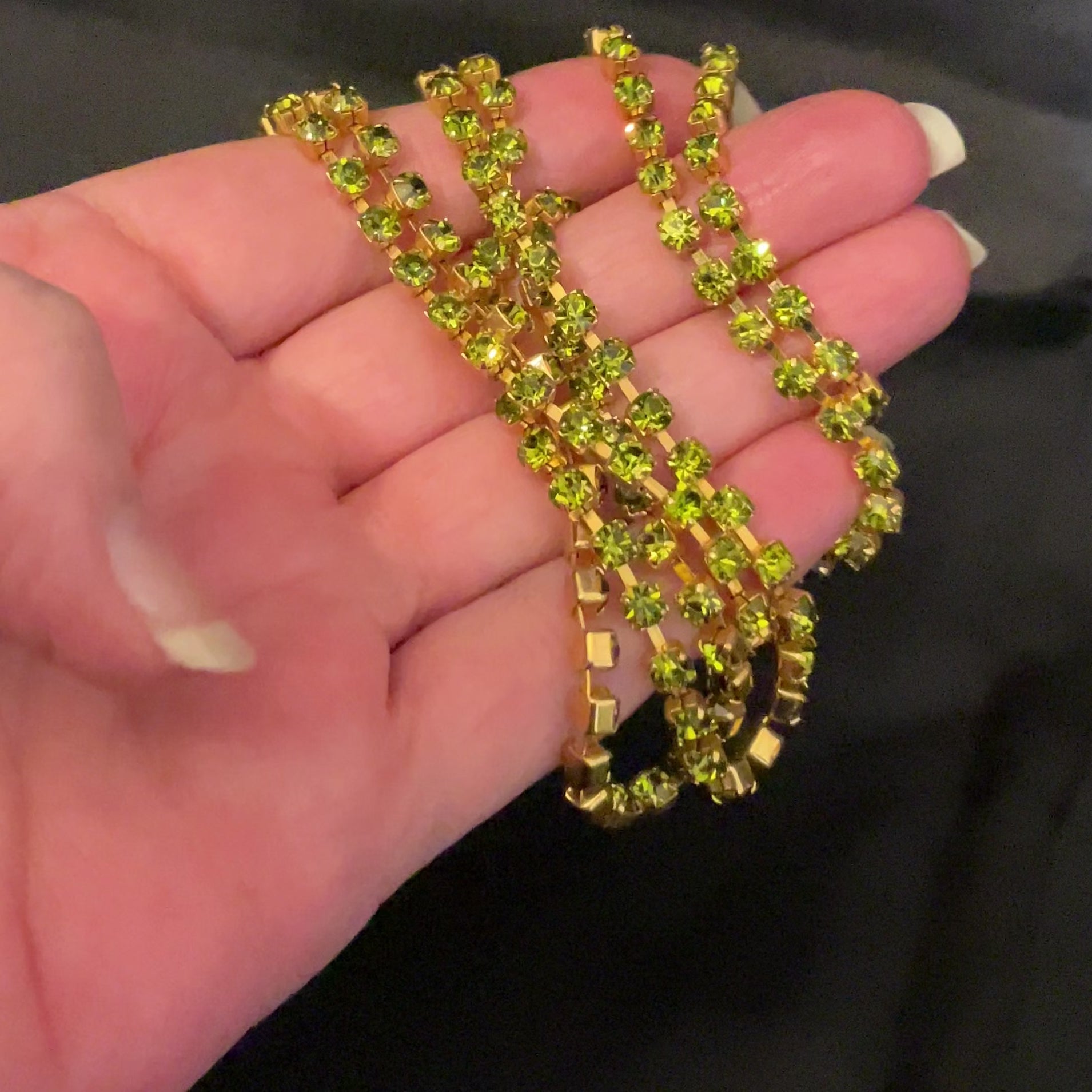 Liz Claiborne Long Peridot Green Color Vintage Rhinestone Necklace video showing how the rhinestones sparkle in the light.