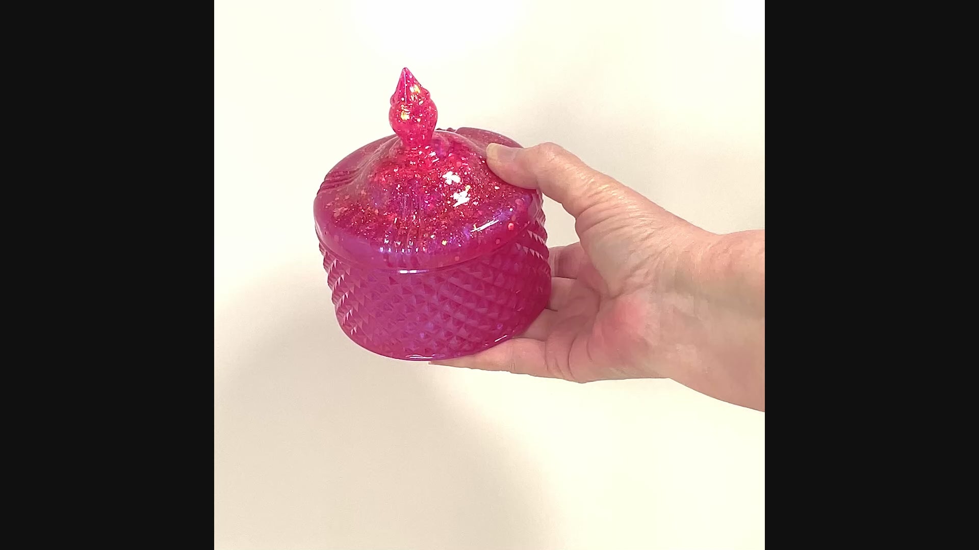 Handmade Pearly Bright Pink Trinket Box Candy Dish with Iridescent Glitter video showing how the glitter sparkles in the light.