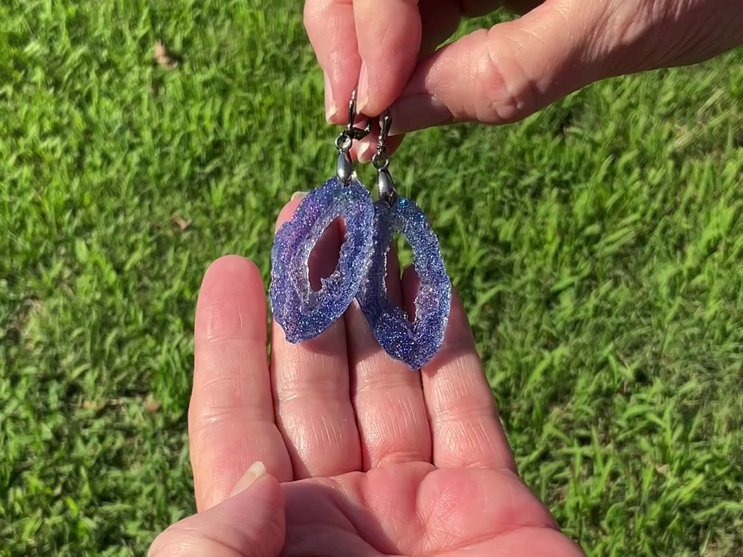 Faux Druzy Geode Blue Glitter Resin Handmade Earrings video showing how the glitter sparkles in the light as they move around.