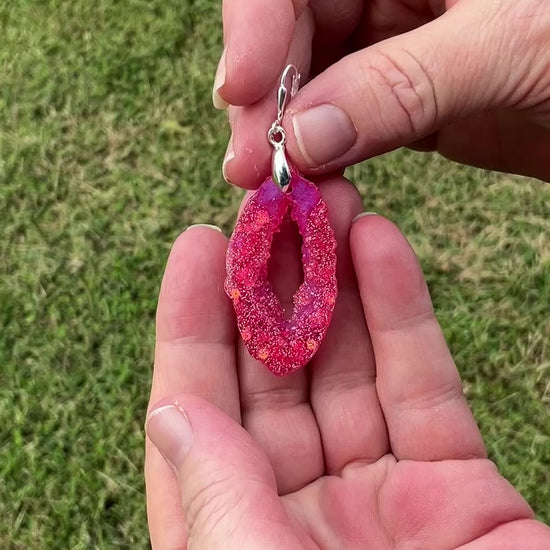 Video of the Handmade Geode Earrings showing how the glitter sparkles in the light.