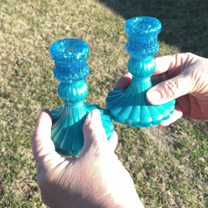 Vintage Style Handmade Pearly Aqua Blue Resin Candlestick Holders video showing how the glitter sparkles in the light.