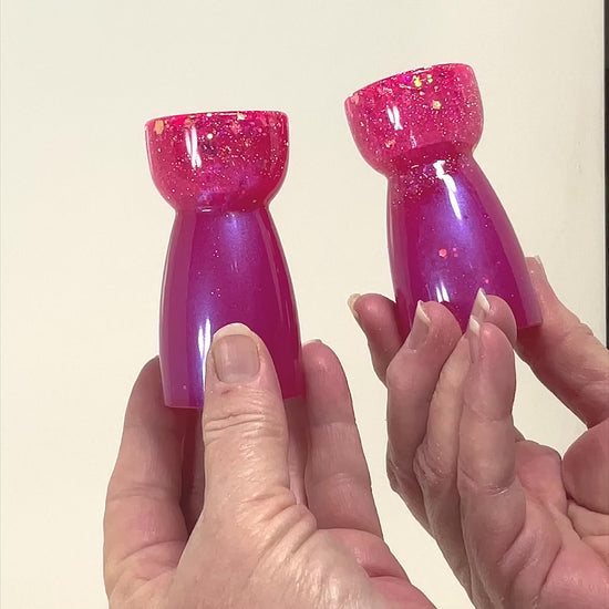 Set of Two Handmade Bright Pearly Pink and Iridescent Glitter Resin Candlestick Holders video showing how the glitter sparkles in the light.