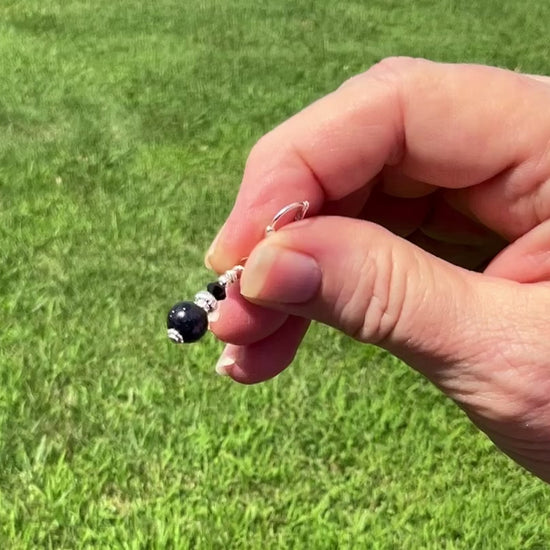 Silver Plated Small Handmade Blue Goldstone Drop Earrings video showing how the glitter sparkles in the light.