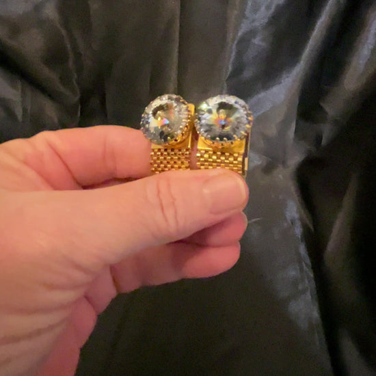 Video of Mid Century vintage Men's cufflinks and tie tack jewelry set showing how the rivoli rhinestones sparkle on the cuff links.