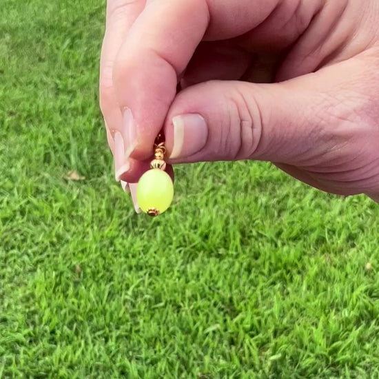 Gold Plated Small Yellow Moonglow Lucite Handmade Drop Earrings video showing how the lucite has a glow like effect in the light. 