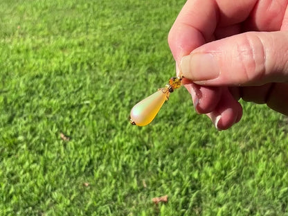 Gold Plated Handmade Yellow Lucite Teardrop Earrings video showing how there is a light AB sheen in the light.