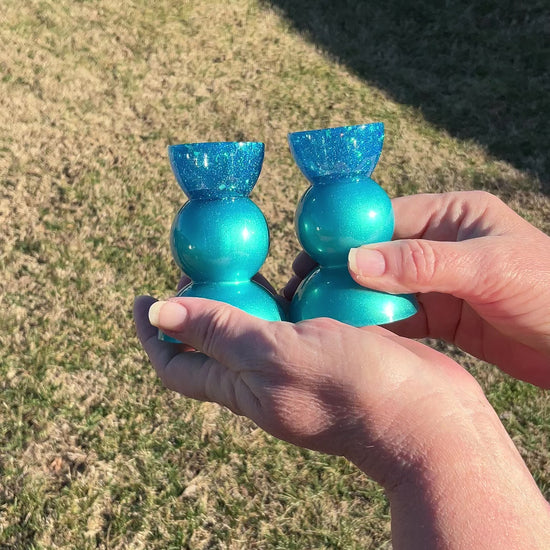 Two Handmade Pearly Aqua Blue Resin Rounded Geometric Candlestick Holders with Chunky Iridescent Glitter video showing how the glitter sparkles in the light.