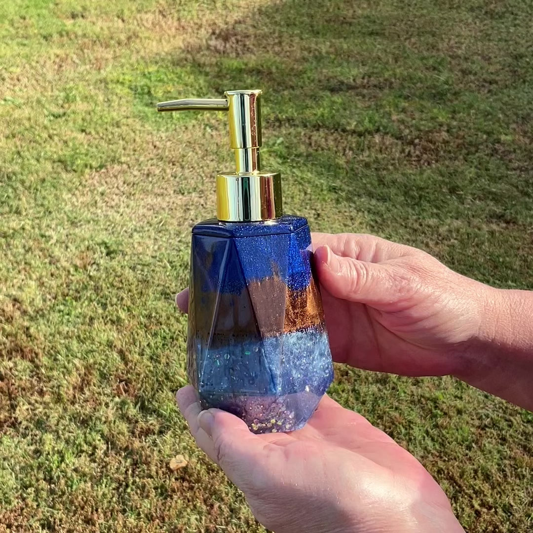 Faceted Handmade Pearly Blue and Brown Resin and Glitter Soap Dispenser video showing how the glitter sparkles in the light.