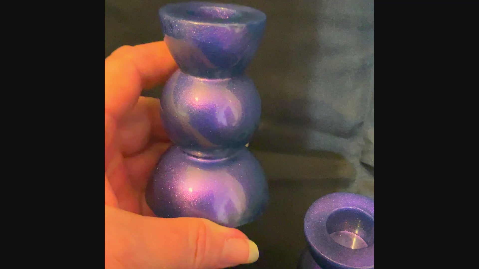 Handmade Pearly Color Shift Purple Green Blue Resin Rounded Geometric Candlestick Holders video showing how the color shifts from purple to green and hints of blue in the light.