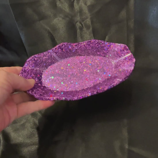 Video of the handmade iridescent purple glitter trinket dish showing how the glitter sparkles in the light.