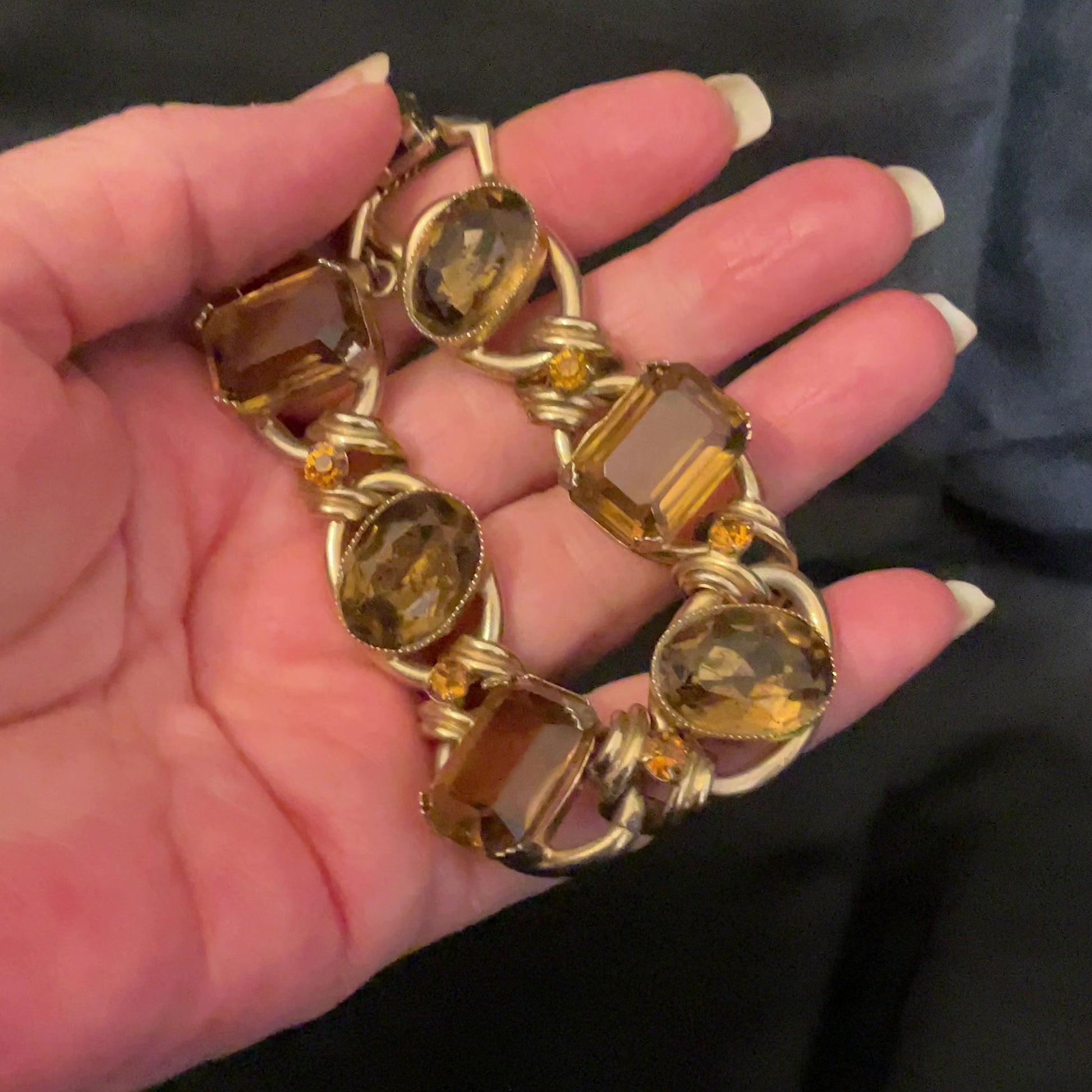 Chunky Topaz and Citrine Color Vintage Rhinestone Bracelet video showing how the rhinestones sparkle in the light.