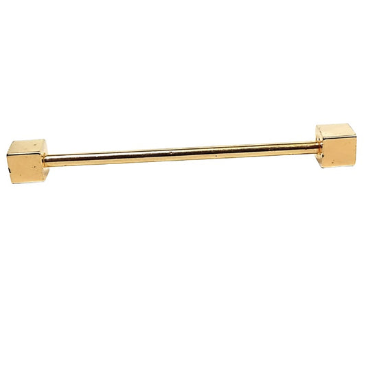 Side view of the retro vintage geometric style cube end collar bar. It is gold tone in color with square ends.