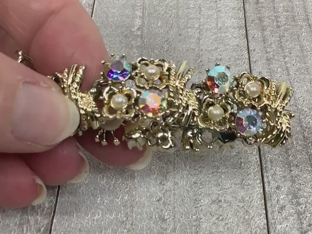 Video of the Mid Century vintage Coro faux pearl and AB rhinestone bracelet to show how the rhinestones sparkle.