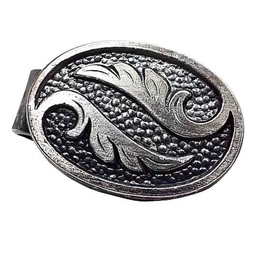 Front view of the small retro vintage oval tie clip. The metal is antiqued silver tone in color. It has a textured dot like pattern on the front with two leaves on it. One leaf is going one direction and the other is going the other direction.