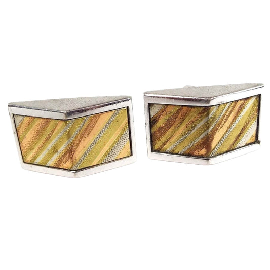 Front view of the retro vintage Anson tri color cufflinks. The front has an angled outward design. There are diagonal striped pieces of metal in silver tone, gold tone, brass color, rose gold color, and copper tone colored metals.