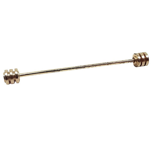 Side view of the Mid Century vintage collar bar with striped barrel ends. It is gold tone in color and has some scuff scratching on the bar part when viewed under magnification.