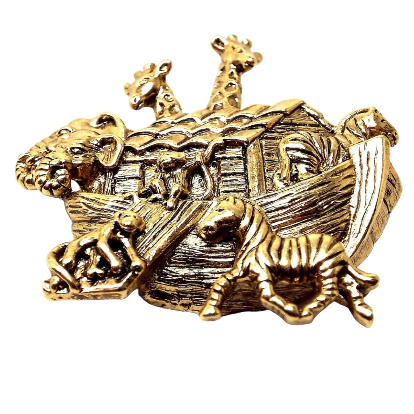 Front view of the retro vintage 1990's Avon Noah's Ark brooch pin. It is antiqued gold tone in color and has a depiction of Noah's Ark with animals on it. 