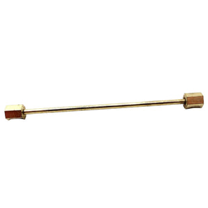 Side view of the Mid Century vintage collar bar. It is gold tone in color and has hexagon ends.