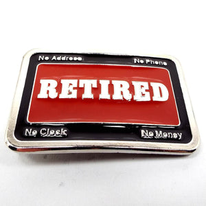 Front view of the retro vintage Retired belt buckle. The metal is silver tone in color. The middle says Retired with red enamel around it. The edge is black enameled and has no address, no phone, no clock, no money on the corners.