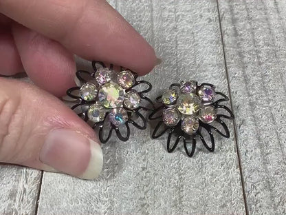 Video showing how the AB rhinestones sparkle on the Mid Century vintage japanned flower clip on earrings.