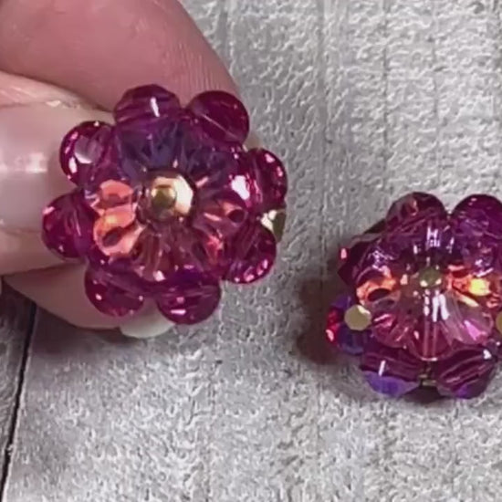 Video showing the sparkle on the Mid Century vintage pink glass crystal beaded clip on earrings.