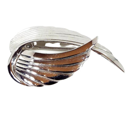 Mid Century vintage Beau Sterling vintage brooch pin. It is shaped like a curved wings. 