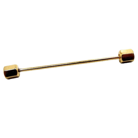 Side view of the Mid Century vintage hexagon end collar bar. It is gold tone in color.