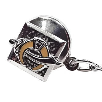 Front view of the Anson Mid Century vintage tie tack. The front part of the tie tack is a small square made of sterling silver that has a textured matte surface. On that is the Scimitar and Horn emblem design for the Shriners. The horn part of the design is yellow enameled. The back clutch is shiny silver plated with a chain that has a bar on the end.