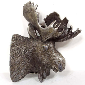 Front view of the retro vintage Bergamot Brass Works moose belt buckle. The metal buckle is pewter with varying shades of darker gray. It has a bust like design of a male moose head with large antlers. It is very detailed and textured in a 3D style design.