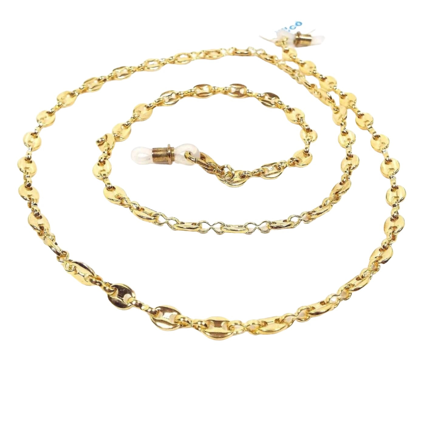 Top view of the retro vintage Hilco vision eyeglass chain. It has an anchor chain with oval links that have two holes that are linked together with figure eight shaped links. The metal is gold tone in color. There is a silicone band at each end to slide over the eyeglass ends and one side has a paper tag that says Hilco on it.